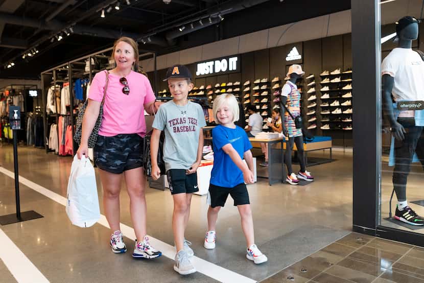 Anndi Risinger of Aledo does some back-to-school shopping with her two sons at NorthPark...