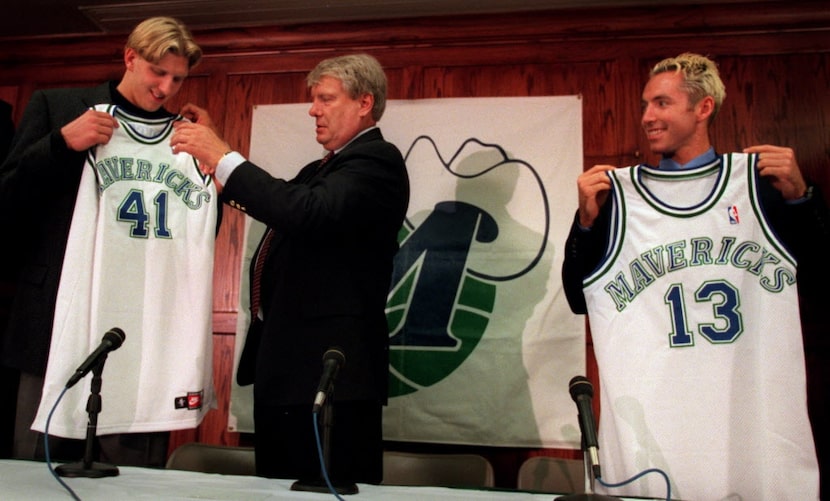 Mavericks head coach Don Nelson, center, presents first-round draft choice Dirk Nowitzki,...