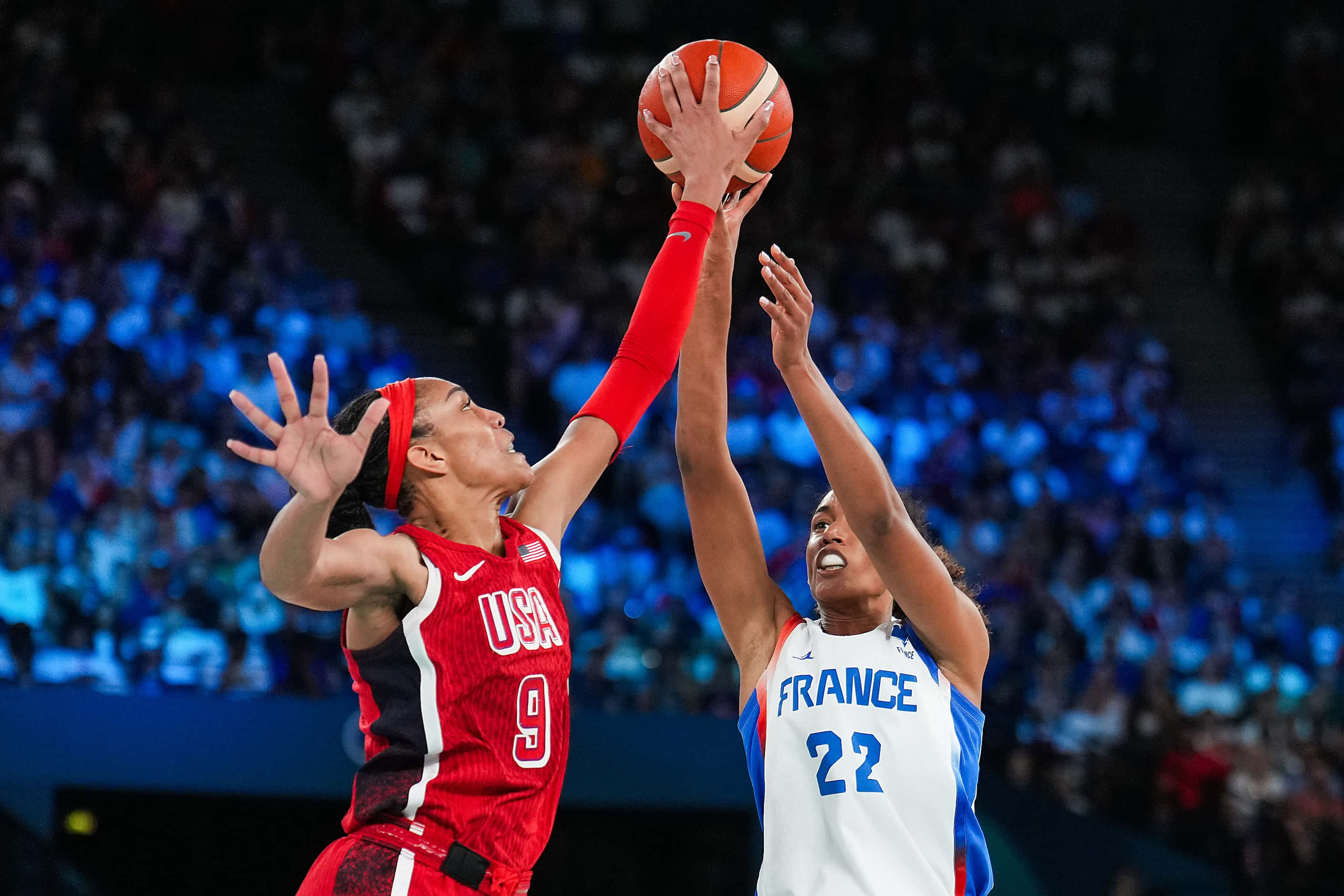 A'Ja Wilson (9) of the United States blocks a shot by Marieme Badiane (22) of France during...