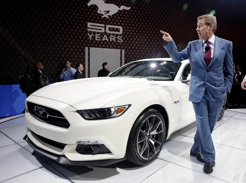 Ford Motor Company CEO and President Bill Ford stands beside a 2015 Ford Mustang 50 Year...