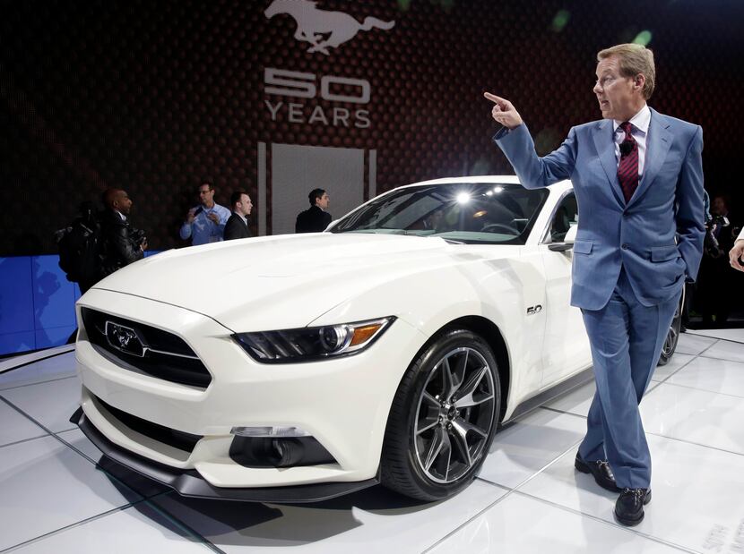 Ford Motor Company CEO and President Bill Ford stands beside a 2015 Ford Mustang 50 Year...