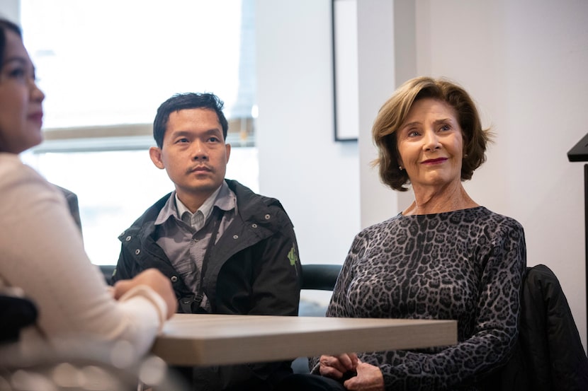 Former first lady Laura Bush tours Bonton Farms in south Dallas with Burmese scholars on...