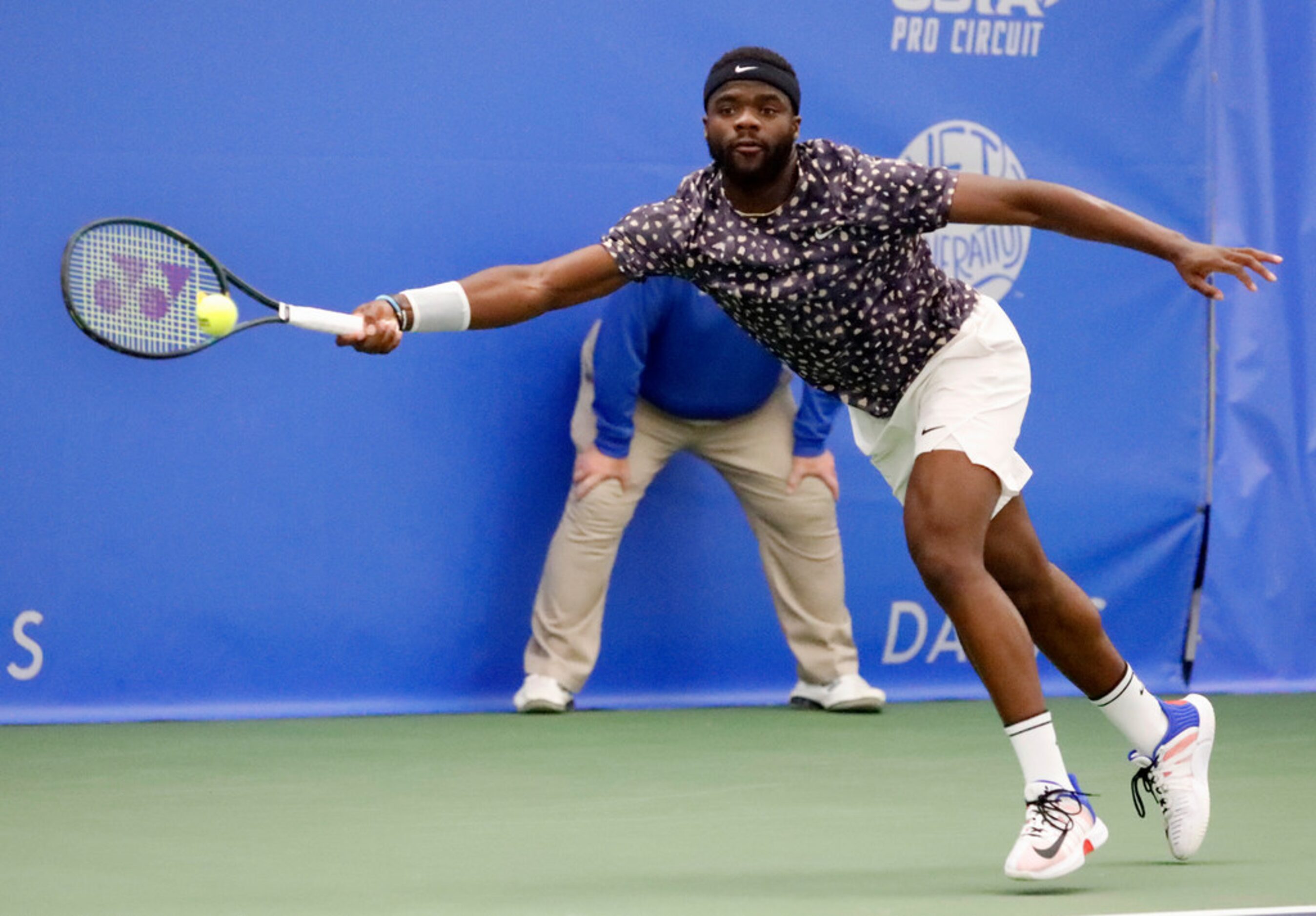 Frances Tiafoe lunges to return volley as he plays Denis Kudla in a match during the RBC...