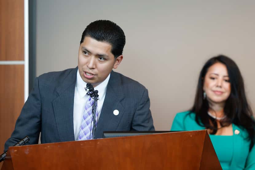 Noe Bernabe-Barrera (left), Texas Christian University student, speaks as State Rep....