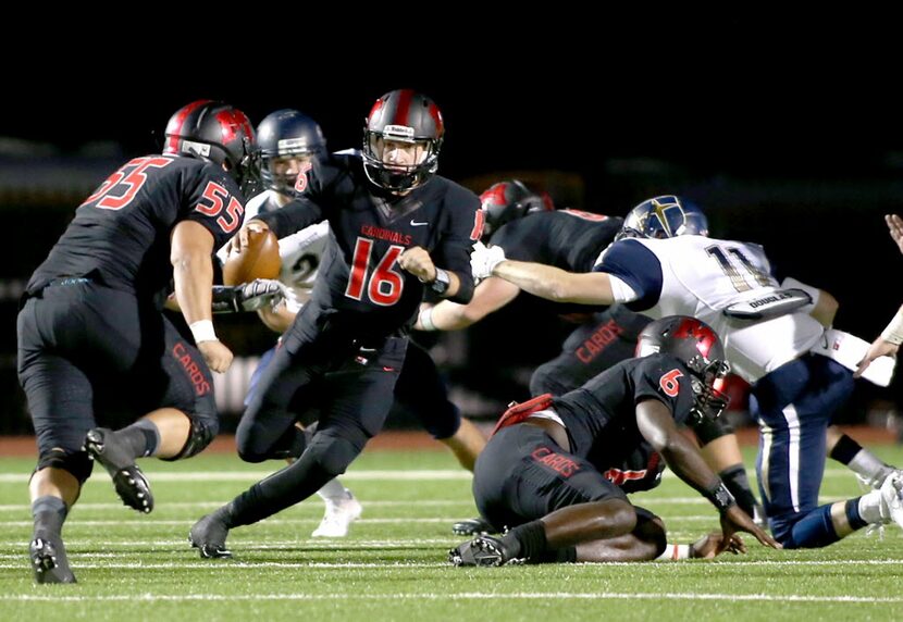 Irving MacArthur’s Kane Hardin (16)  works his way through Jesuit’s defense during game...