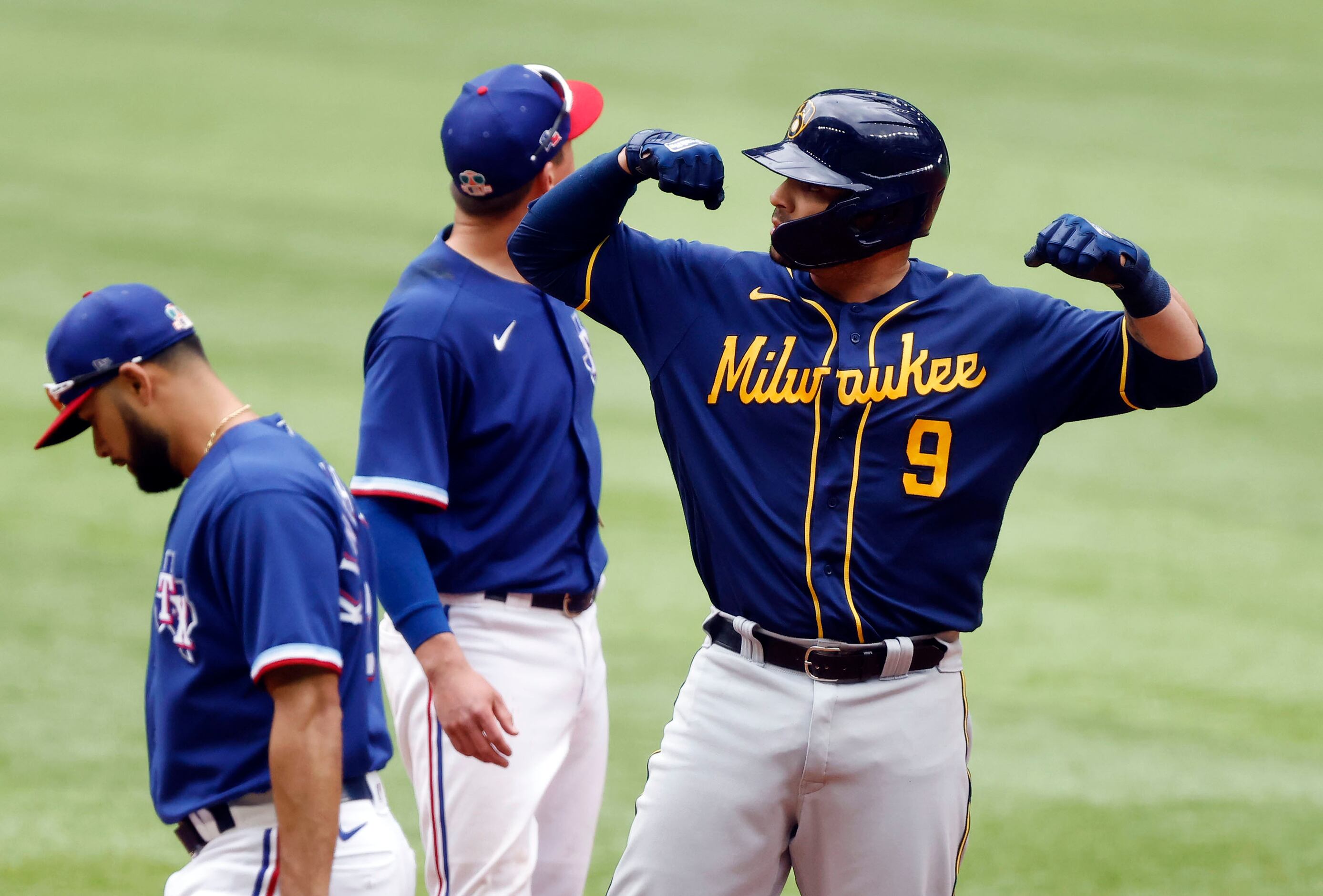 Milwaukee Brewers batter Manny Pina (9) flexes after making it to second on a single to...