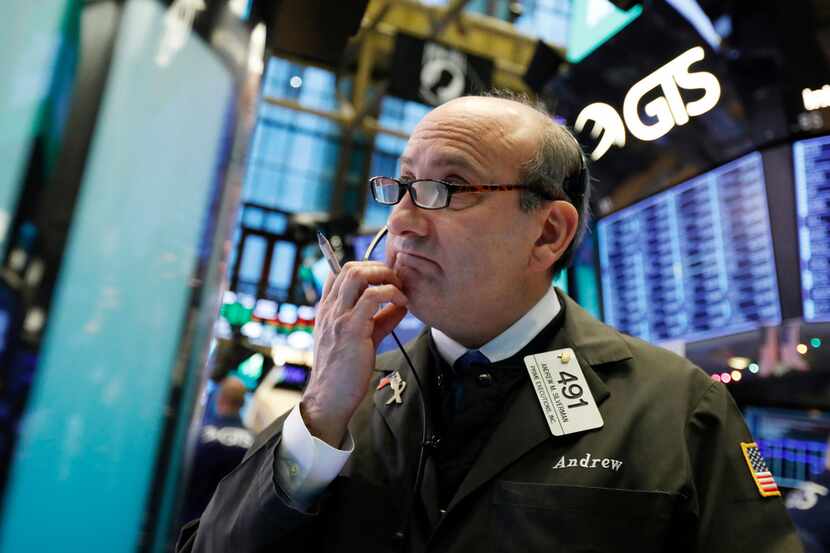 Trader Andrew Silverman works on the floor of the New York Stock Exchange, Thursday, Dec. 27,.
