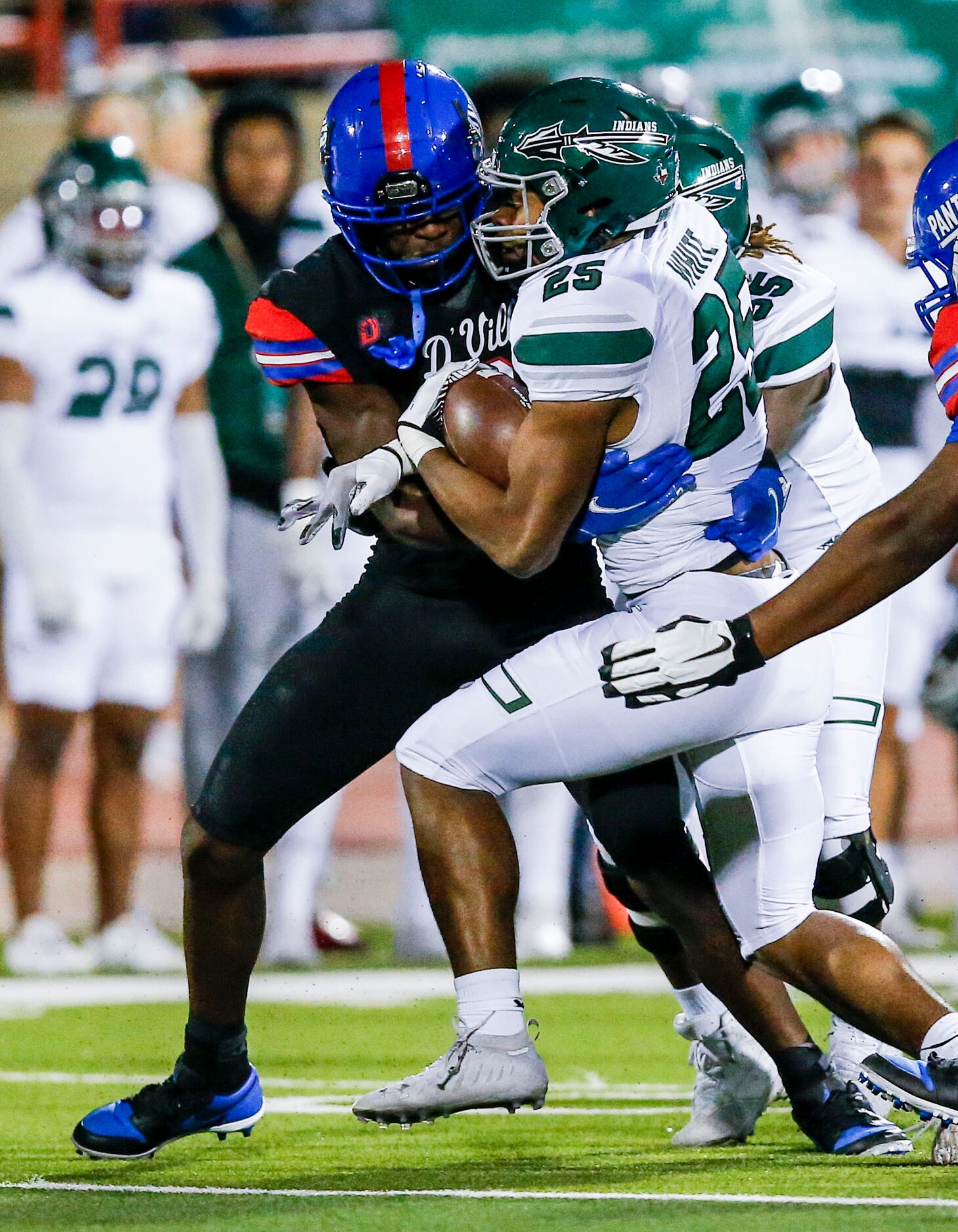 Duncanville sophomore linebacker Colin Simmons (8) tackles Waxahachie senior running back...