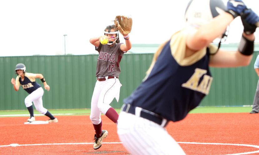 Lewisville pitcher Maribeth Gorsuch (12) delivers a pitch to a Keller batter during the...
