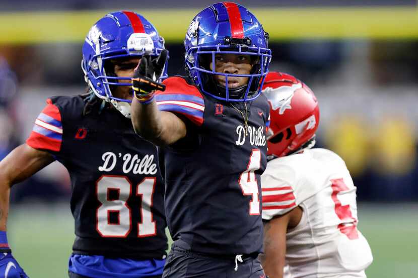 Duncanville wide receiver Dakorian Moore (4) signals first down after catching a long first...