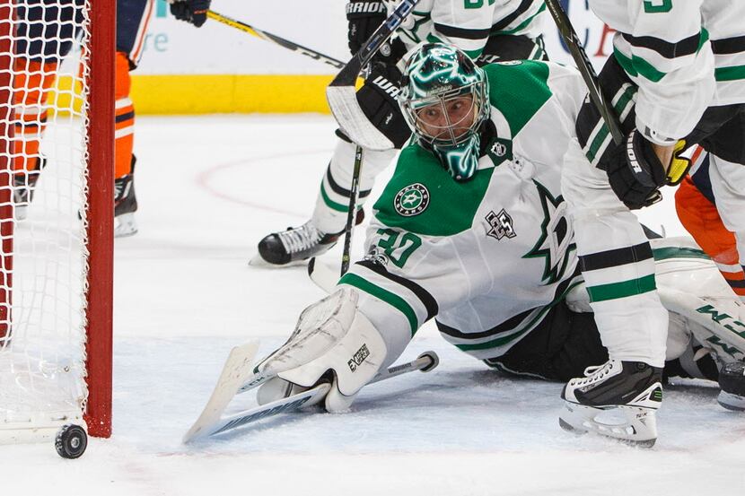 Dallas Stars goalie Ben Bishop (30) makes the save against the Edmonton Oilers during the...