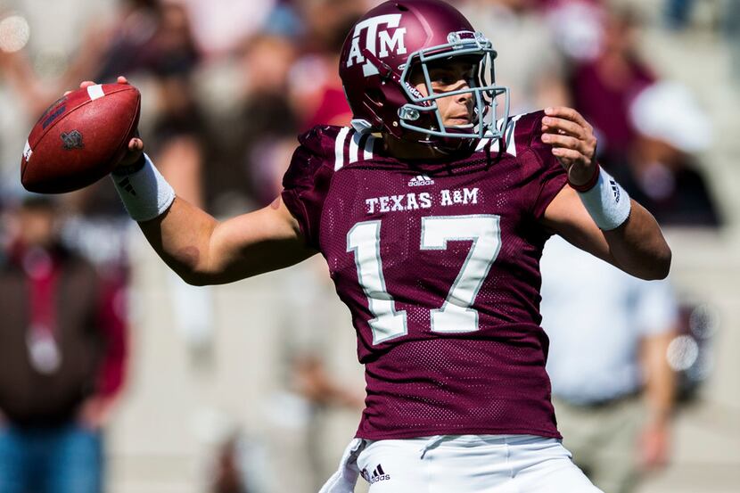 Texas A&M Aggies quarterback Nick Starkel (17) throws a pass during the first quarter of a...