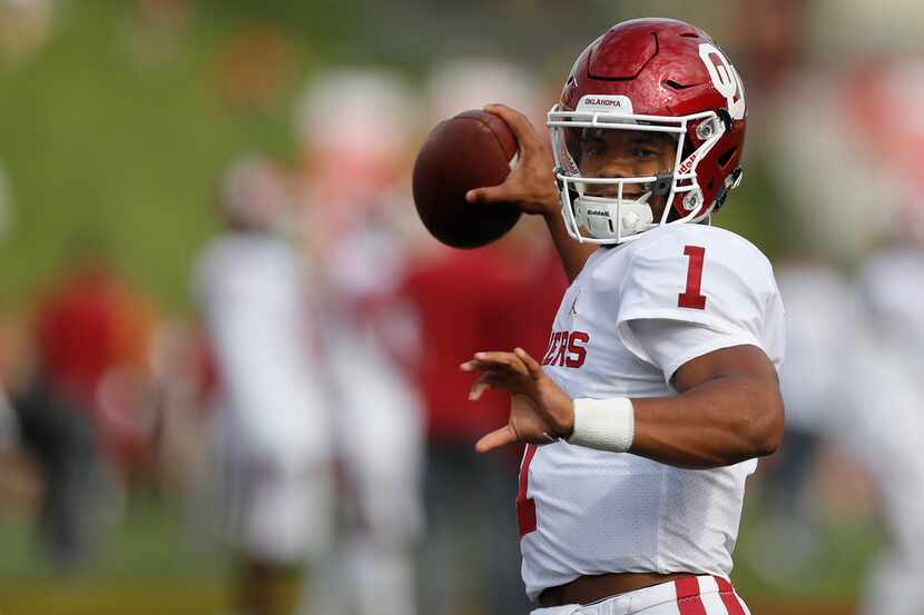 Oklahoma quarterback Kyler Murray warms up before an NCAA college football game against Iowa...