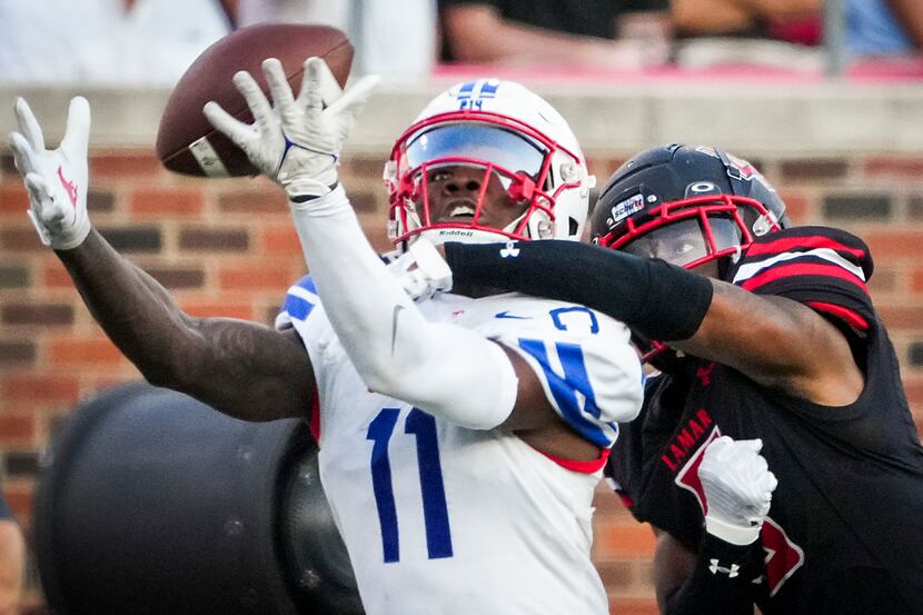 Lamar Cardinals defensive back Damian Alexander (5) commits a pass interference penalty on a...
