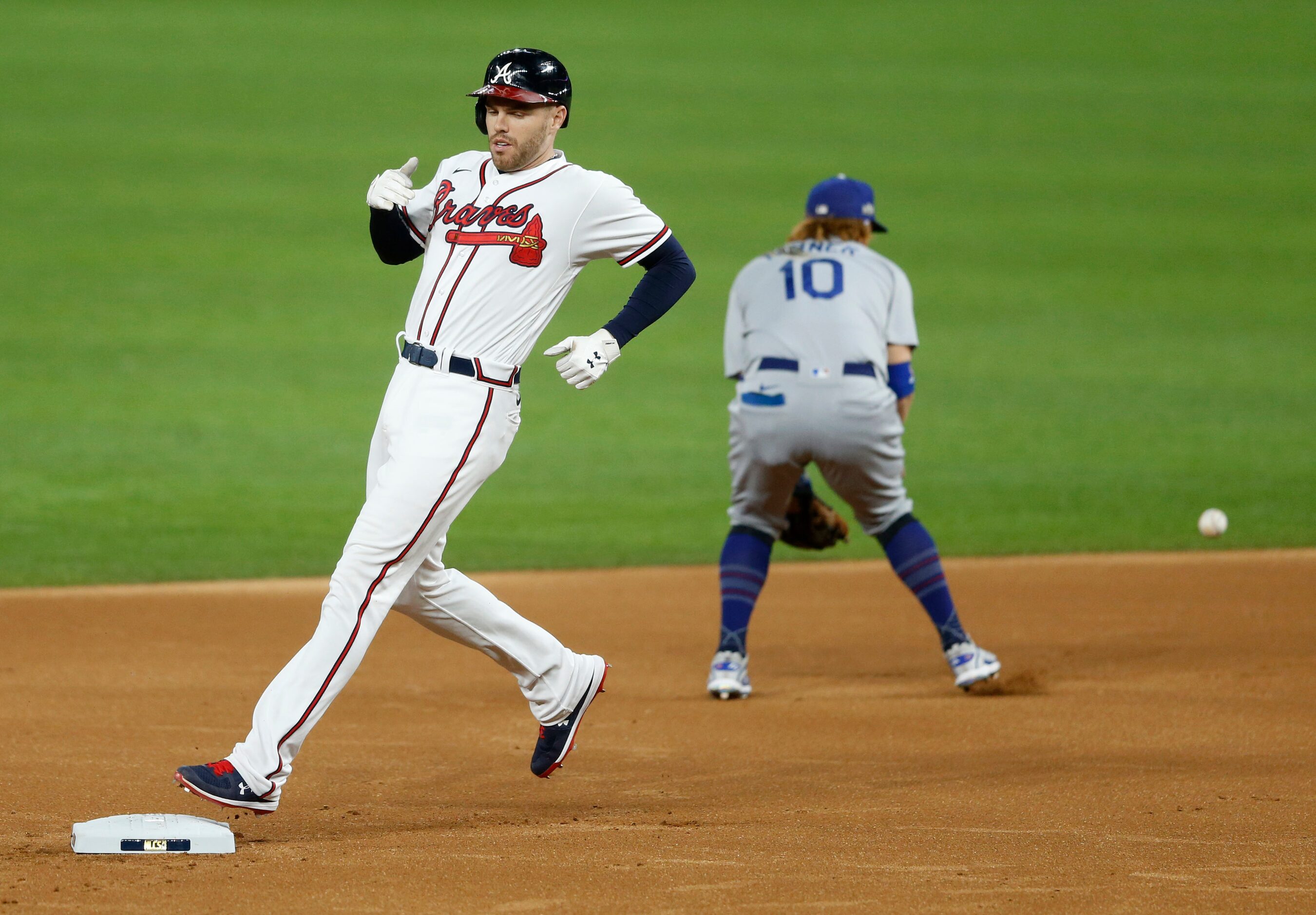 Atlanta Braves first baseman Freddie Freeman (5) steps on second base after hitting a double...