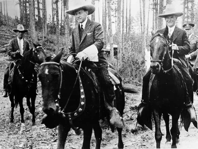 In this Aug. 15, 1927 photo, President Calvin Coolidge is on horseback to attend the...