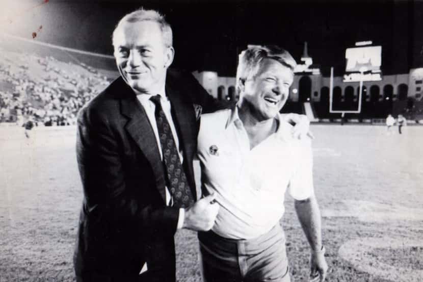 August 19, 1989 - Dallas Cowboys owner Jerry Jones and coach Jimmy Johnson walk off the...