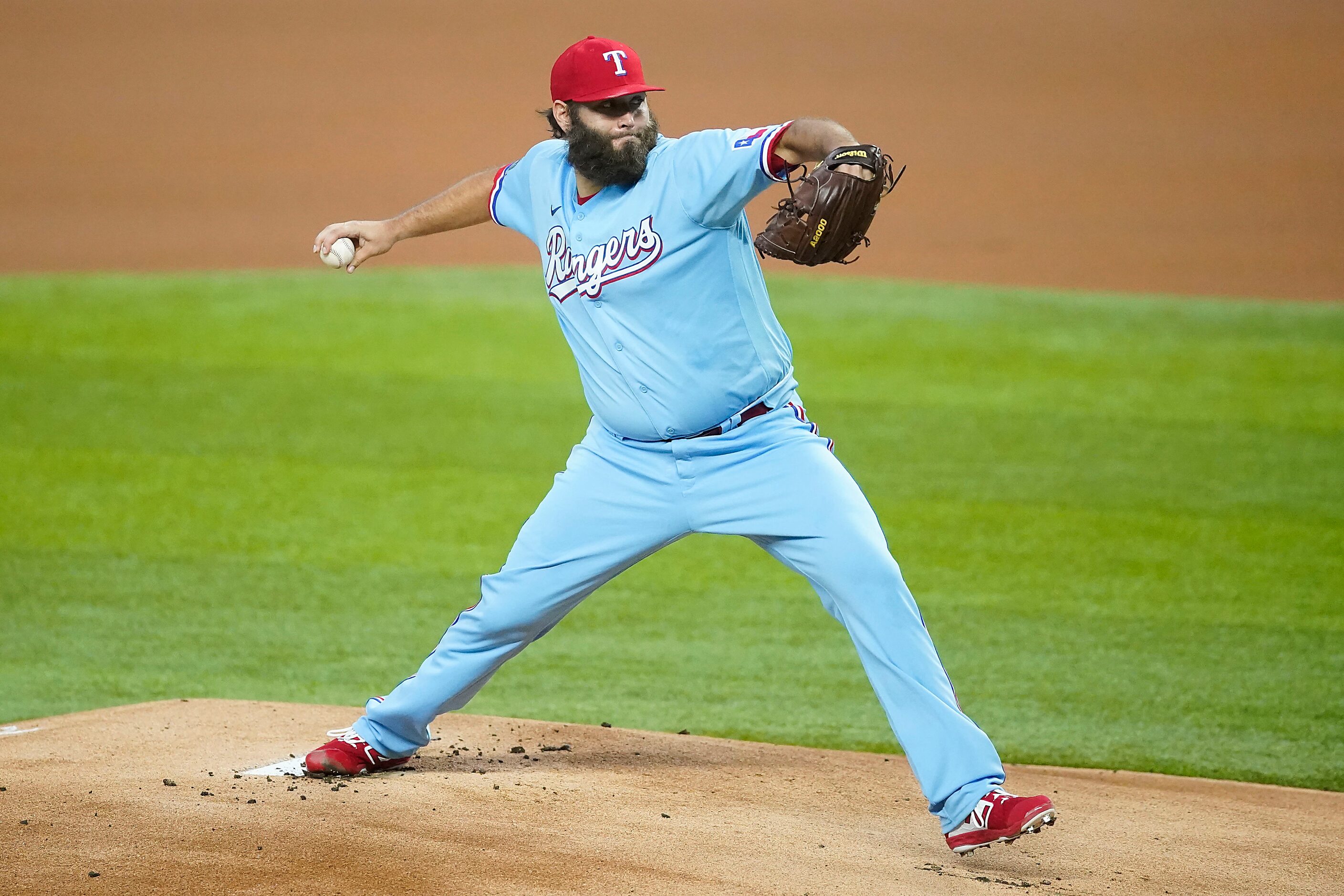 Texas Rangers pitcher Lance Lynn delivers during the first inning against the Los Angeles...