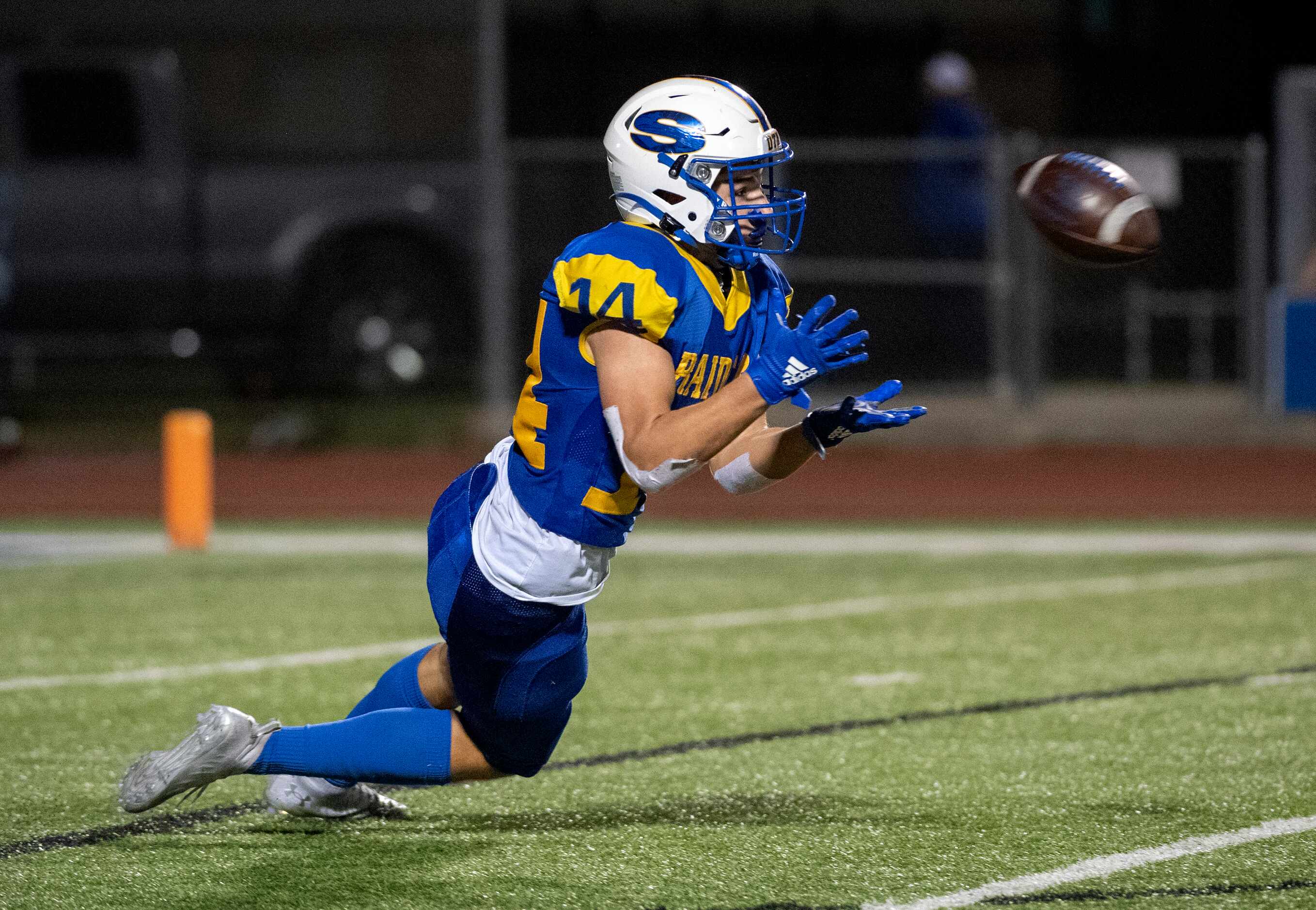 Sunnyvale junior wide receiver Landry Laird (14) hauls in a pass in the second half of a...