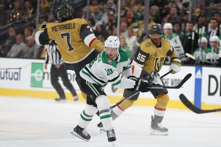 Dallas Stars center Ty Dellandrea (10) checks Vegas Golden Knights defenseman Alex...