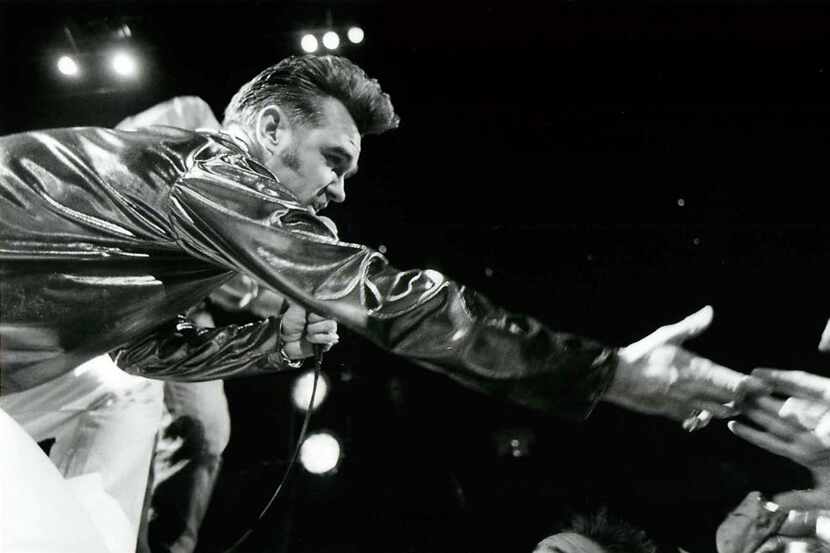 Shot November 4, 1992 - PUBLISHED November 5, 1992 - REACHING OUT: Morrissey stretches out...