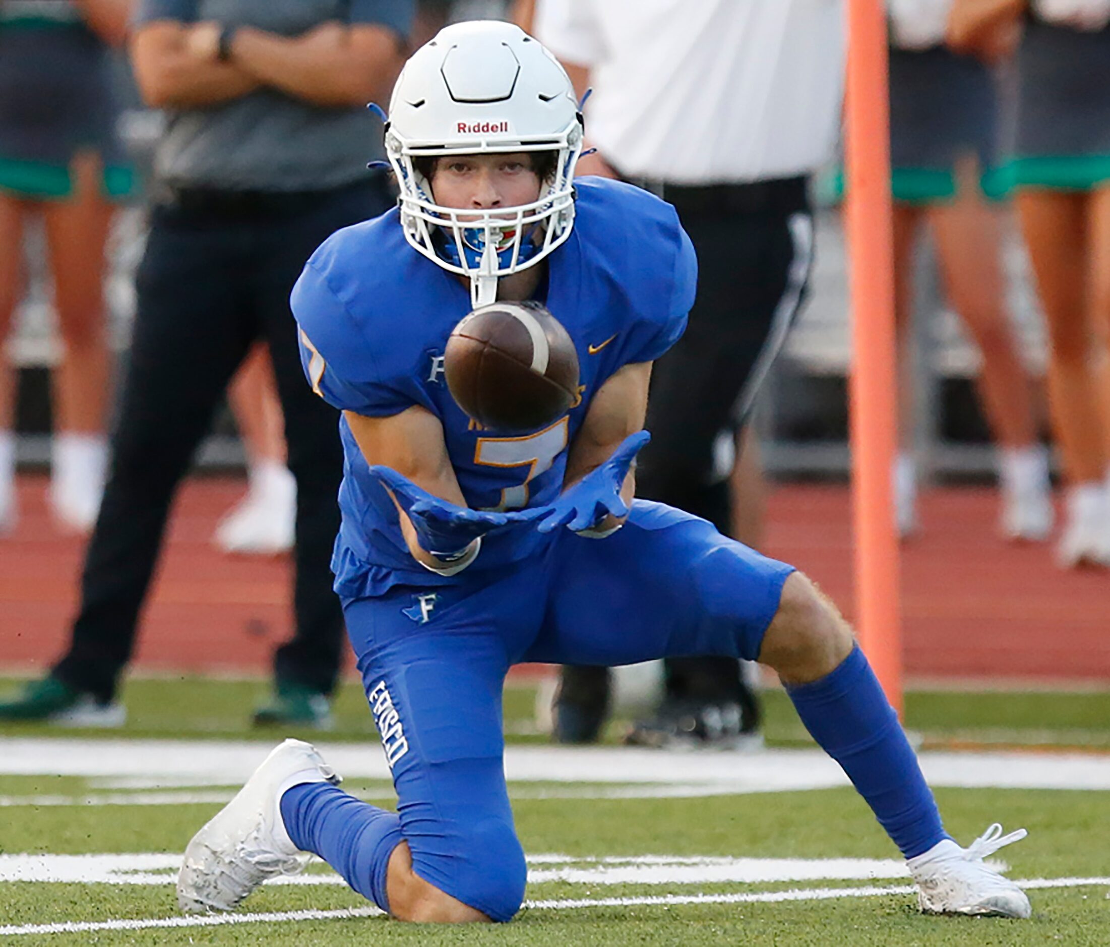 Frisco High School wide receiver Andrew Middleton (7) catches a pass during the first half...