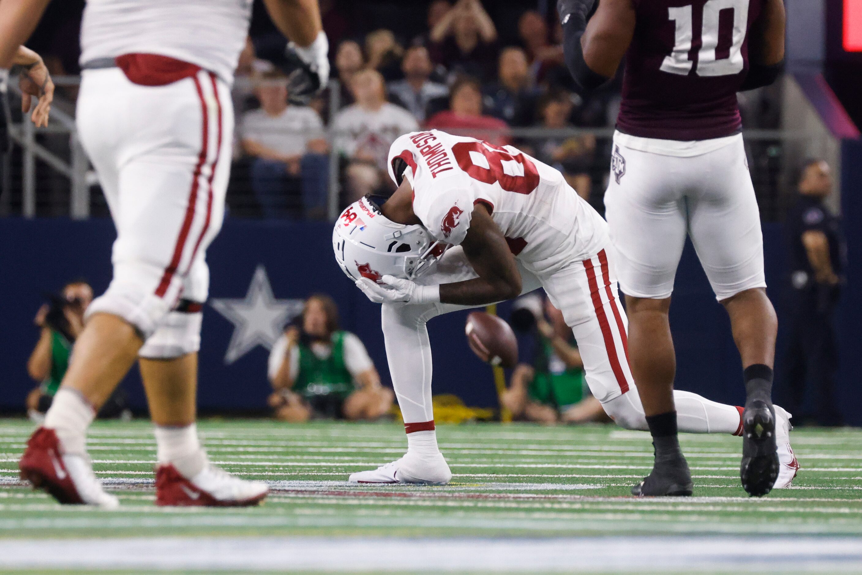 Arkansas wide receiver Warren Thompson (84) reacts as he misses to receive a pass against...