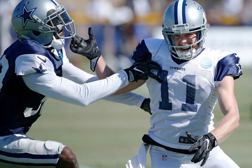 Dallas Cowboys cornerback Anthony Brown (30) puts his hands on Dallas Cowboys wide receiver...