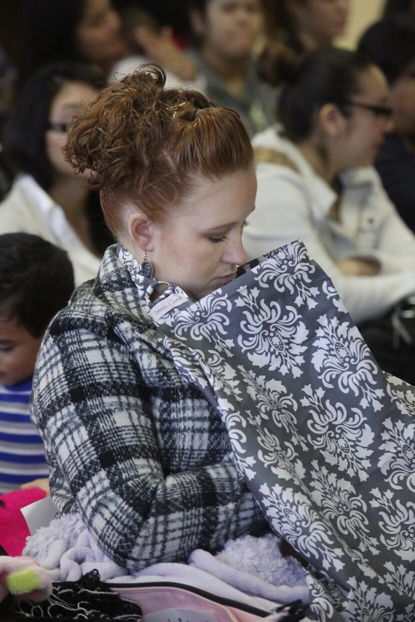 Jennifer Stephenson (right),  with 3-week-old Laila Snyder (under the blanket), was among...