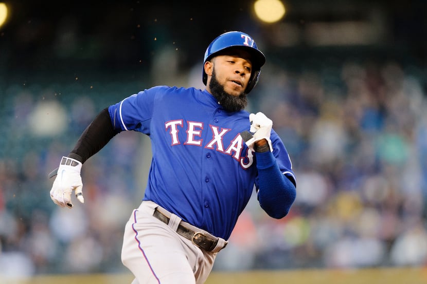 Apr 25, 2014; Seattle, WA, USA; Texas Rangers shortstop Elvis Andrus (1) runs towards home...