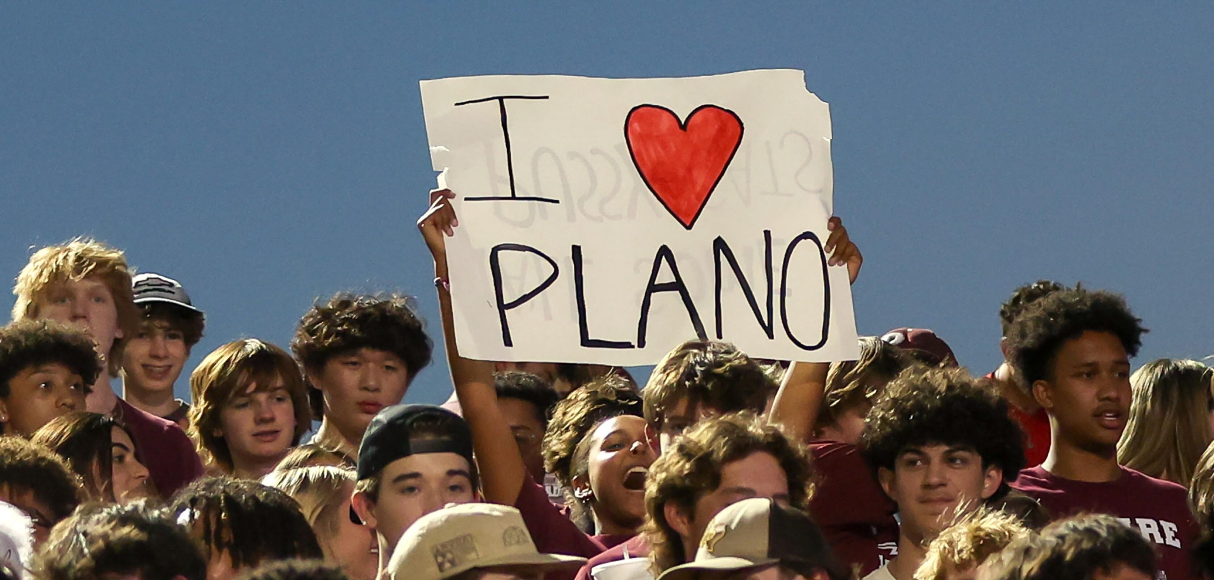 A Plano student holds up a sign during the game against Byron Nelson in a high school...