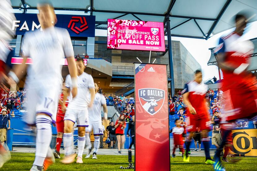 FC Dallas and Orlando City SC take the field before the soccer game at Toyota Stadium in...