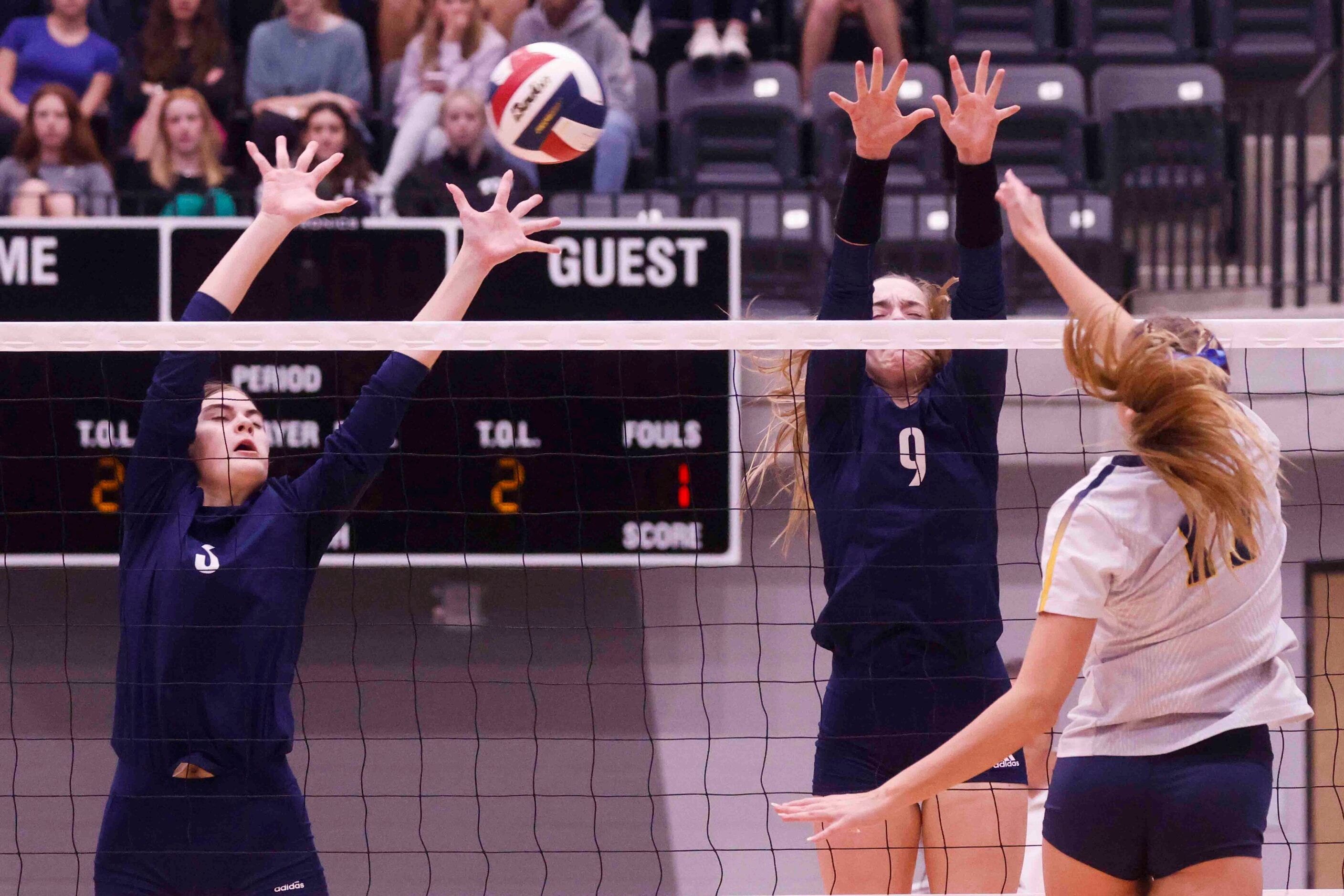 Flower Mound high’s Liz Goodspeed (3), left, and Cat Young attempts to block a shot against...