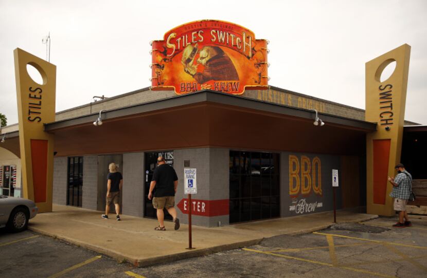 Members of the Texas BBQ Posse enter Stiles Switch BBQ & Brew on N. Lamar in Austin.