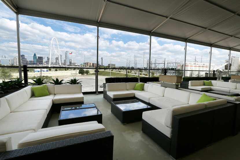 Saint Rocco's covered rooftop lounge has a view of the Dallas skyline. 