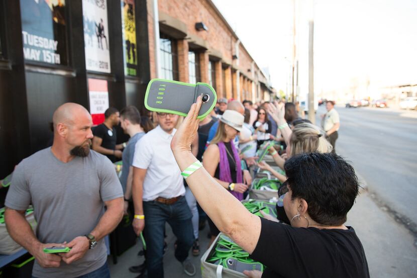 Yondr pouches are distributed outside the Bomb Factory prior to the Jack White concert in...