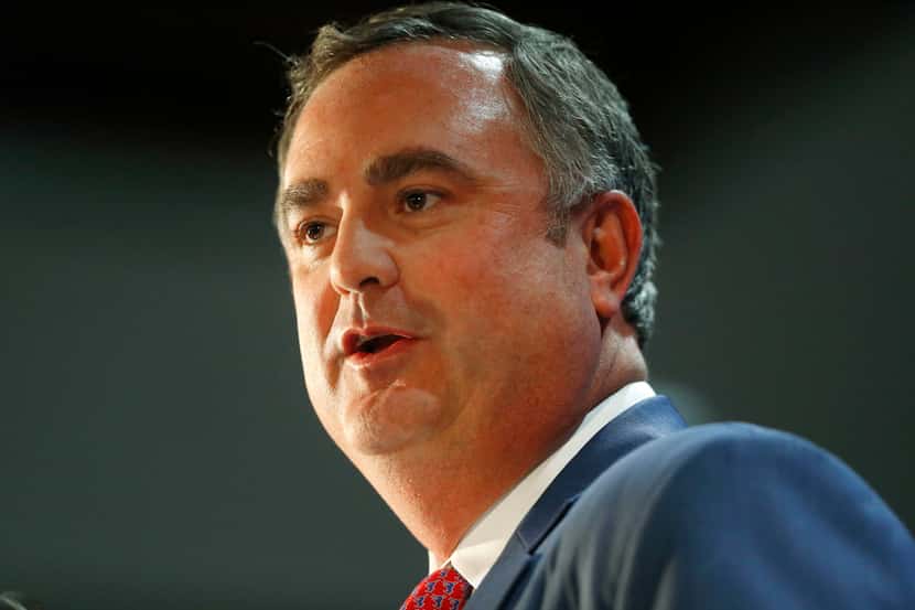 SMU's new football coach Sonny Dykes addresses the crowd and media upon his announcement at...