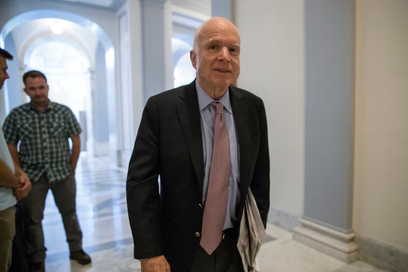 Sen. John McCain, R-Ariz., arrives at his office on Capitol Hill in Washington, Monday,...