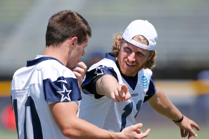 Dallas Cowboys wide receiver Cole Beasley (11) talks with Dallas Cowboys wide receiver Ryan...