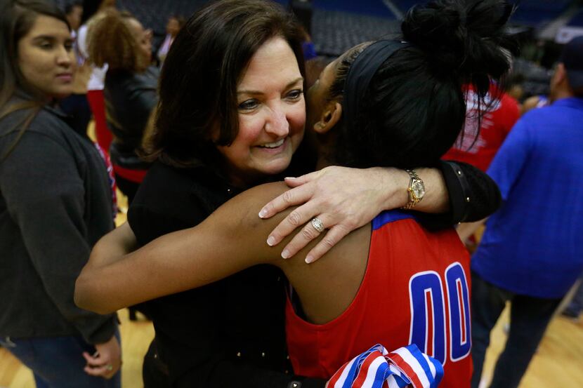 Duncanville head coach Cathy Self-Morgan celebrates a 76-65 win over Houston Cypress Ranch...