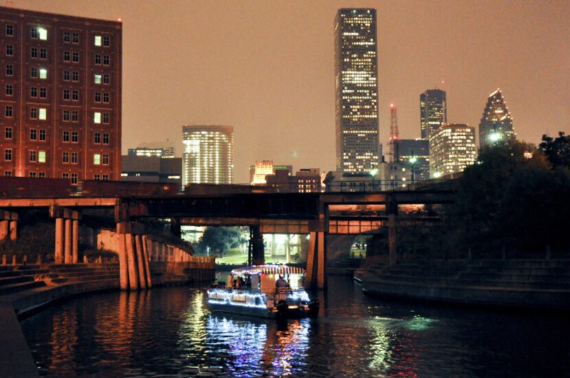 A quiet, uncrowded way to see the lights in Houston is a pontoon cruise on Buffalo Bayou.