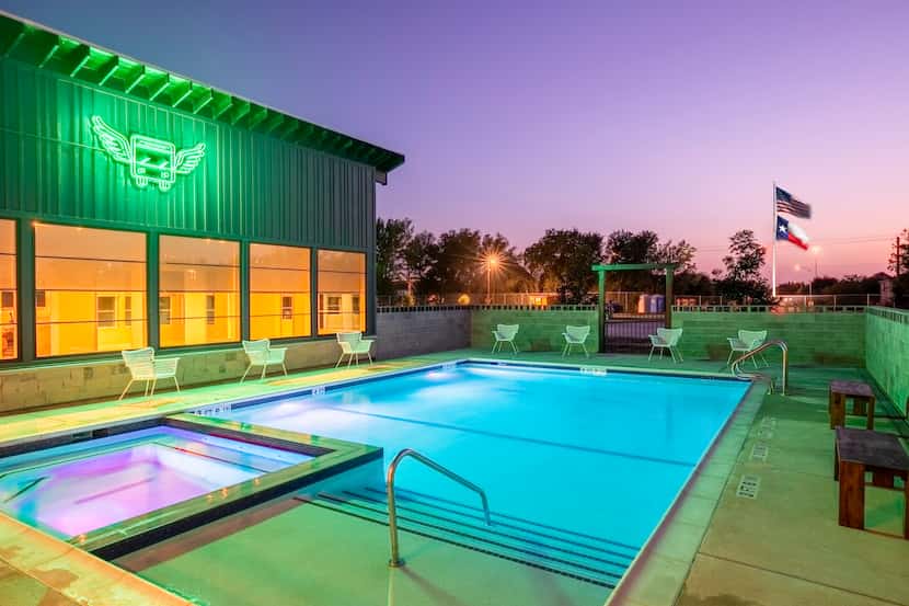 Eric & Jay’s RV Resort in Houston features a pool with a Jacuzzi and a modern...