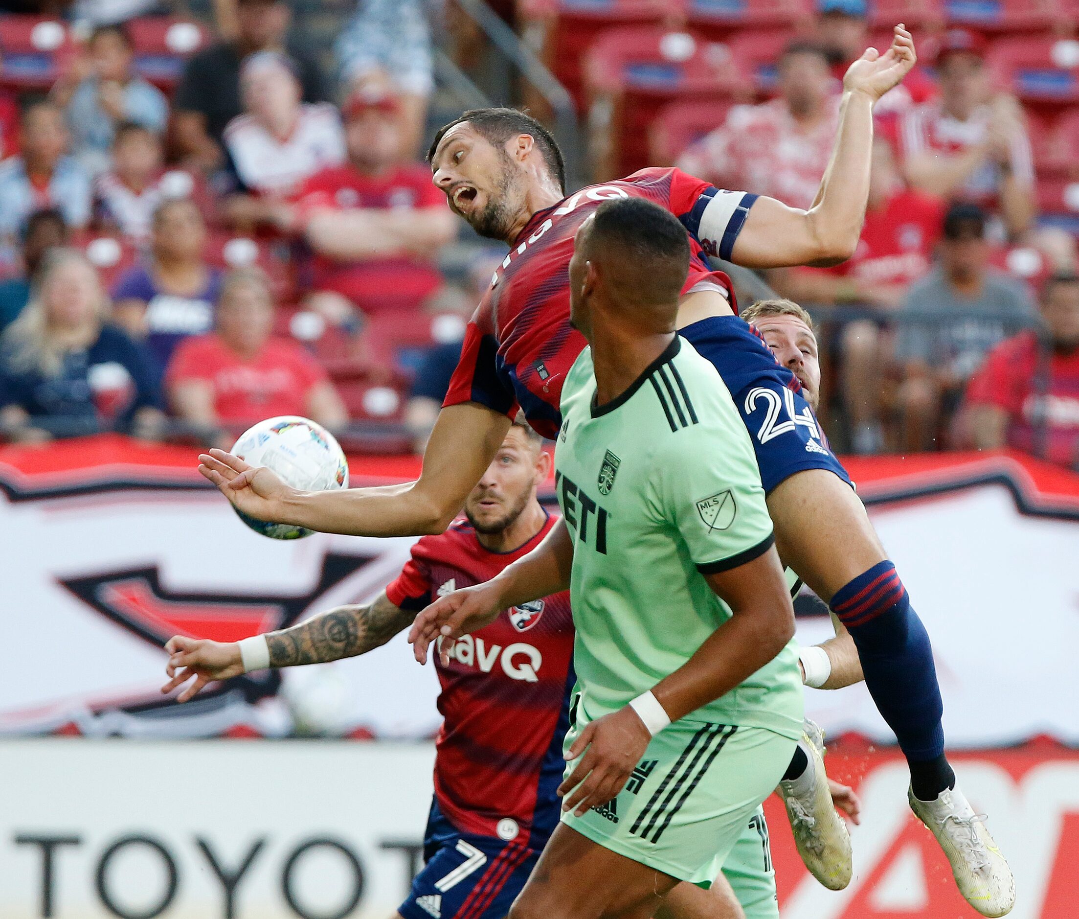 FC Dallas defender Matt Hedges (24) tries to head the ball into the goal behind Austin FC...