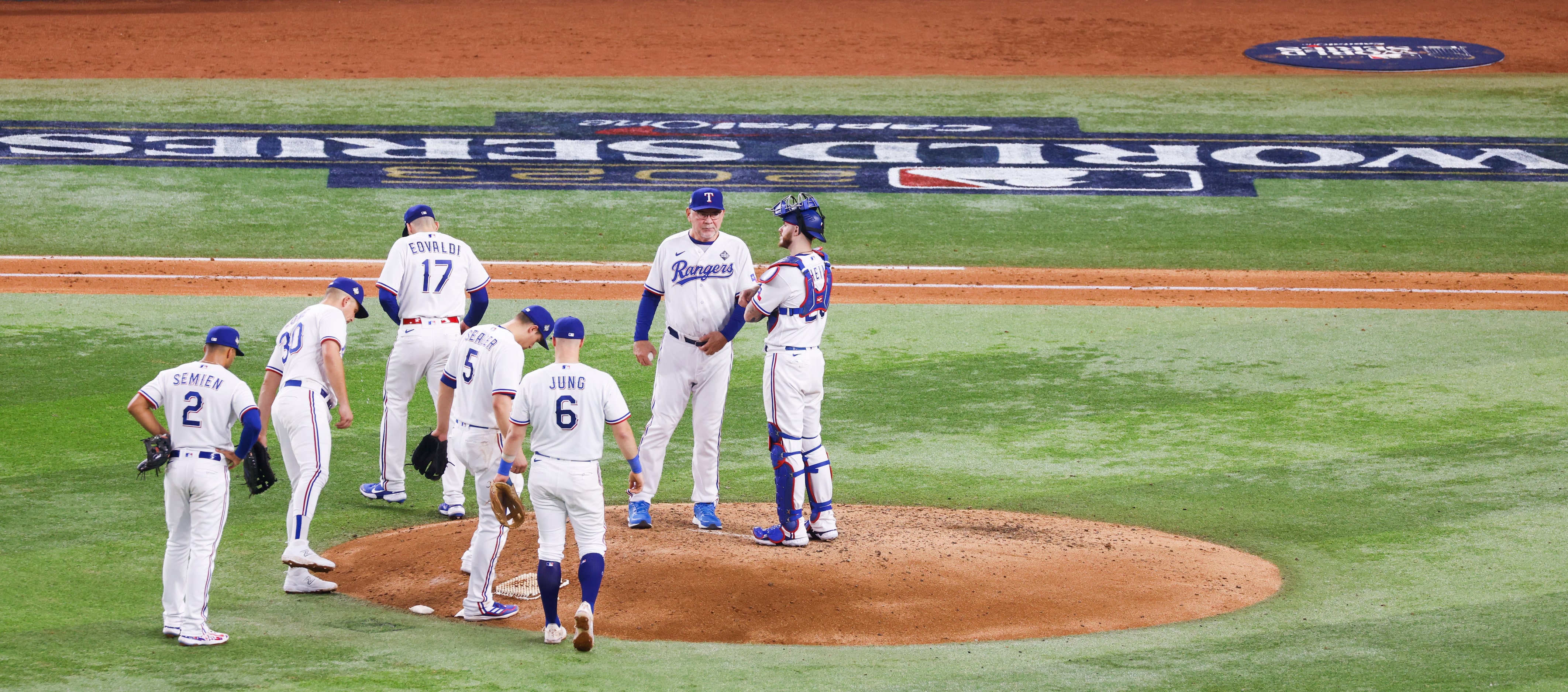 Texas Rangers starting pitcher Nathan Eovaldi (17) is pulled from the game by Rangers Manger...