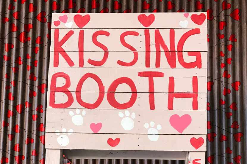 This month's Pooches & Smooches parties will include a kissing booth. (Waterside)