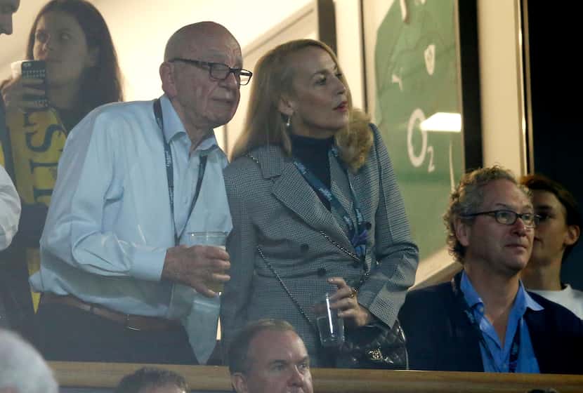 Rupert Murdoch stands with model Jerry Hall during the Rugby World Cup final between New...