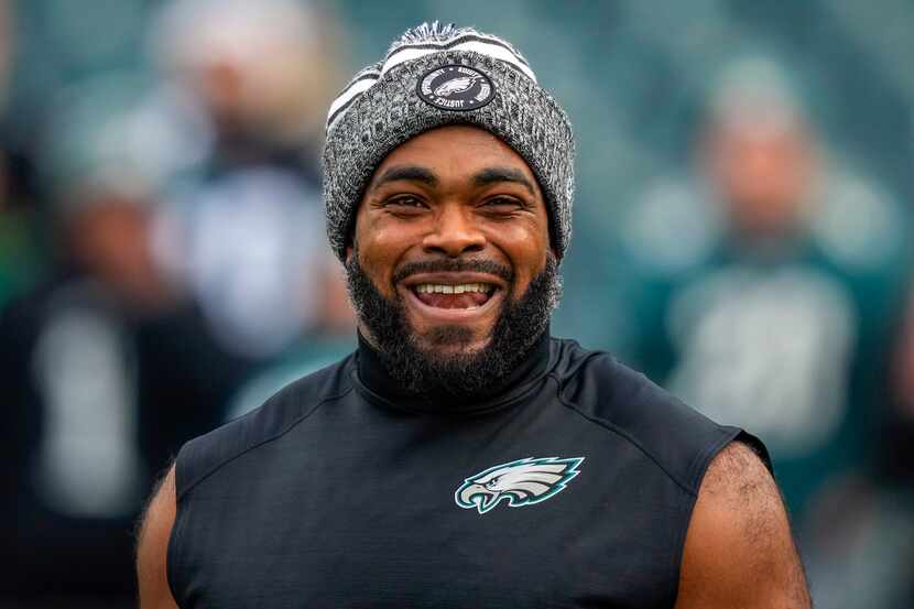FILE - Philadelphia Eagles defensive end Brandon Graham smiles during warm ups before an NFL...