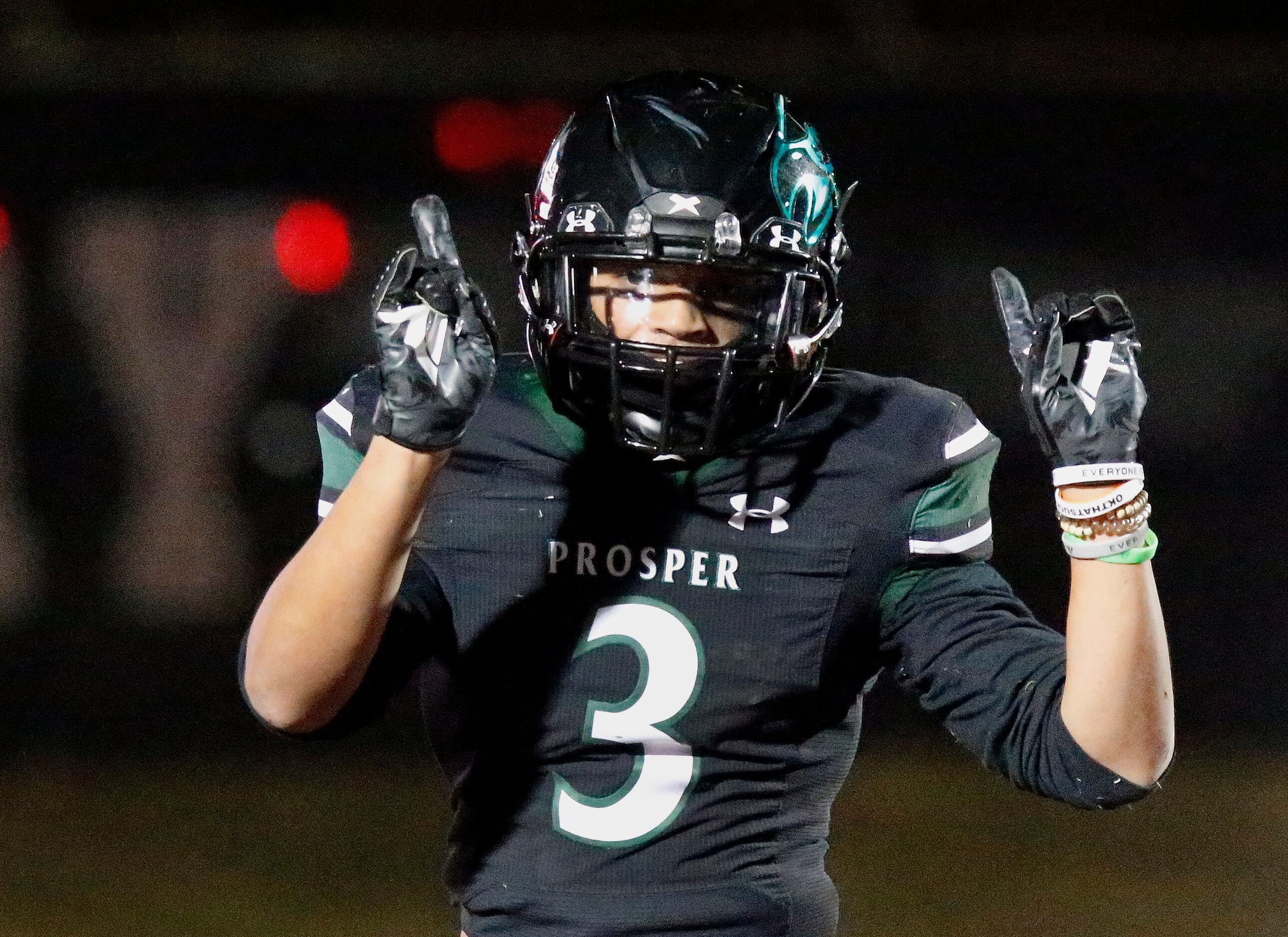 Prosper High School running back Malik Dailey (3) celebrates his touchdown run during the...