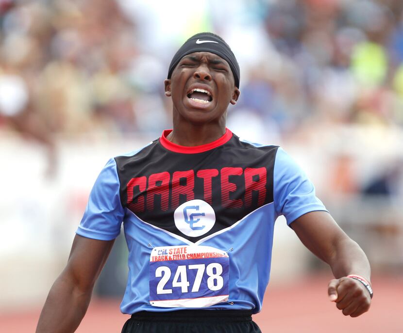 Carter's Lakyron Mays celebrates after winning in the 4A boys 400-meter dash on the final...