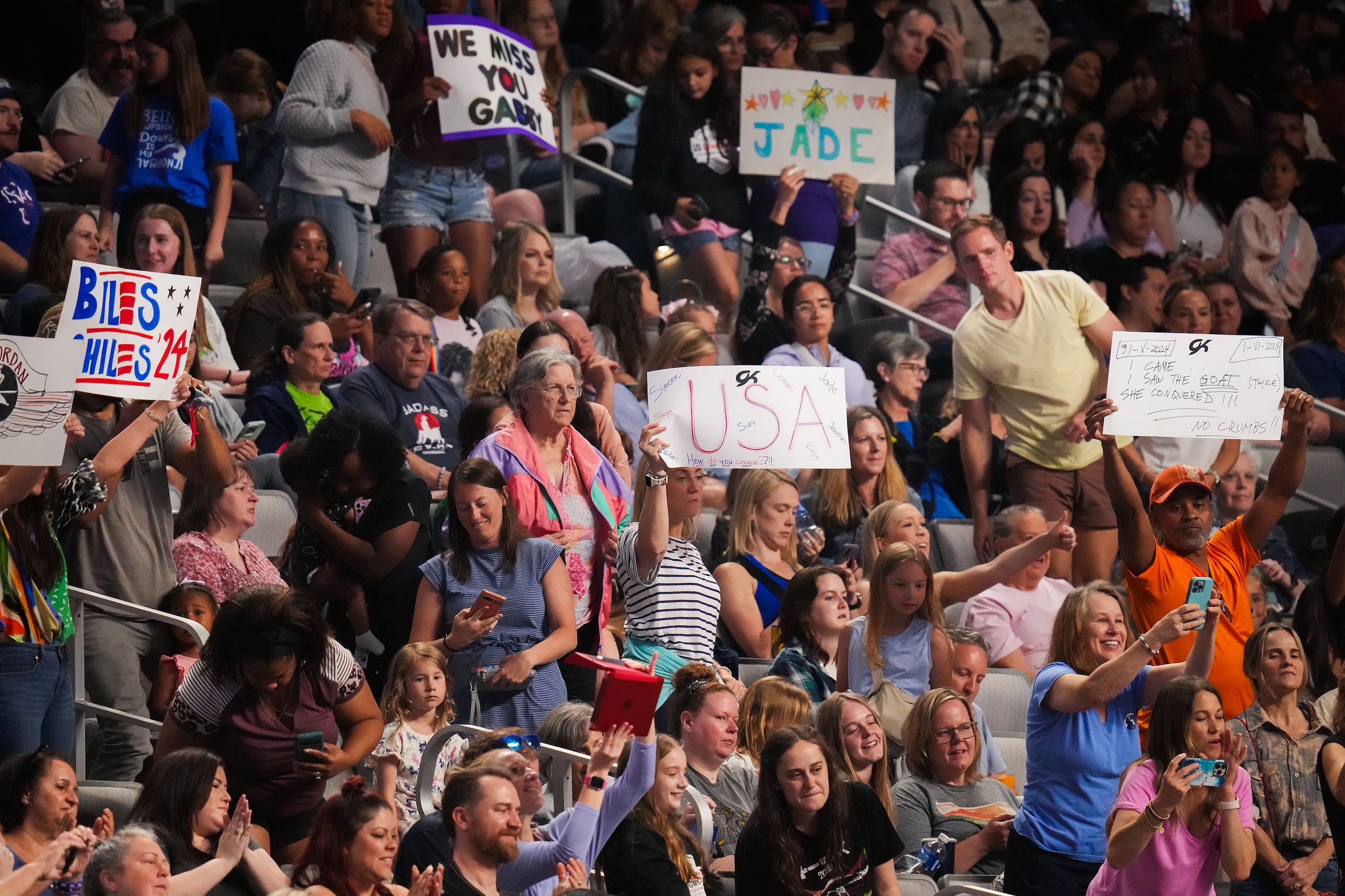 Fans cheer after Simone Biles competed on the floor during the U.S. Gymnastics Championships...